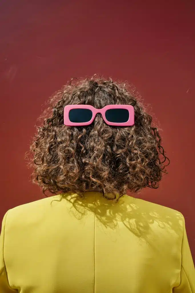 back of a woman with shades